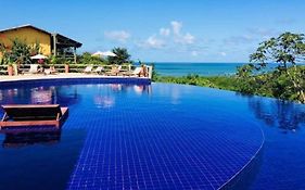 Quarto e sala com piscina em Maceió - Villas Tulipa 02